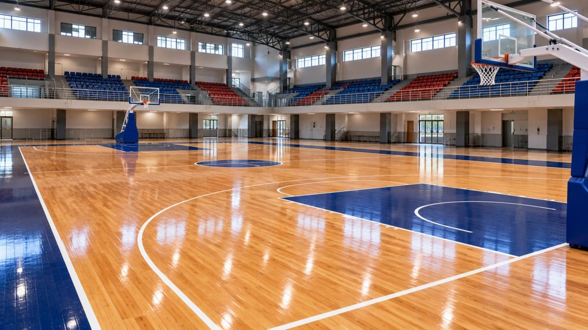 Basketball Court Flooring Indonesia: FIBA Specs & Price 1 Finished wooden basketball court floor showing the painted key and hoop area