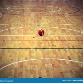 Ball Basketball in the Basketball Court with a Wooden Parquet Stock ...