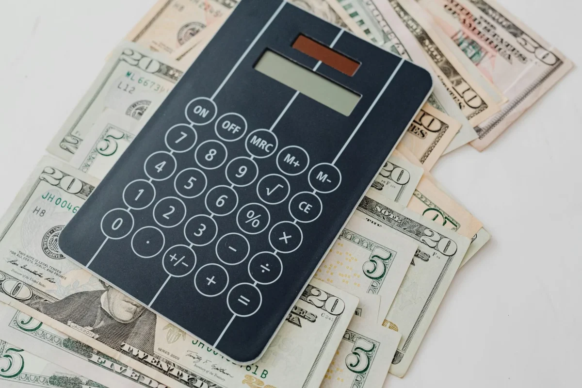 Foto oleh www.kaboompics.com di Pexels Budget Planning Calculator
