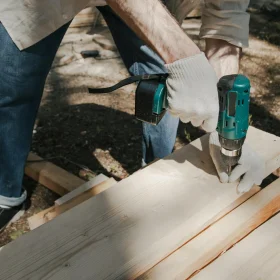 Carpenter At Work Floor Installation Power Tools