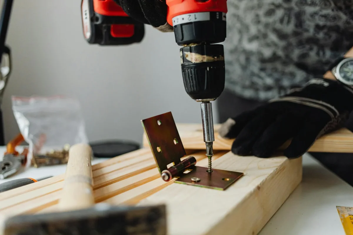 Foto oleh www.kaboompics.com di Pexels Carpenter Working Floor Installation