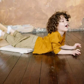child playing wooden floor Child Playing Wooden Floor