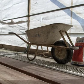 Apakah Renovasi Lantai Parket Mahal? Cek Biaya & Solusinya 2026 9 Construction Site Blueprint Measurement