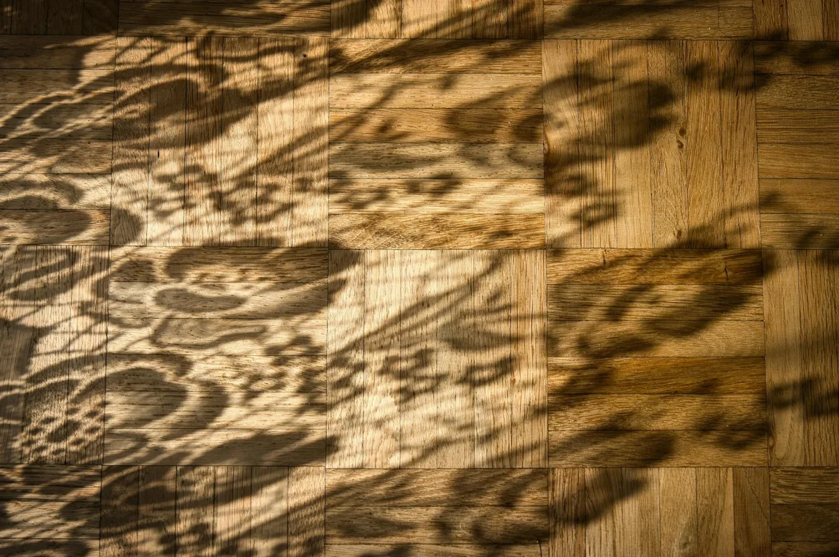 7 Jenis Kayu Terbaik untuk Lantai Parket 2026 4 Dark Wood Floor Exotic Interior
