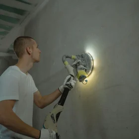 Floor Sanding Construction Worker