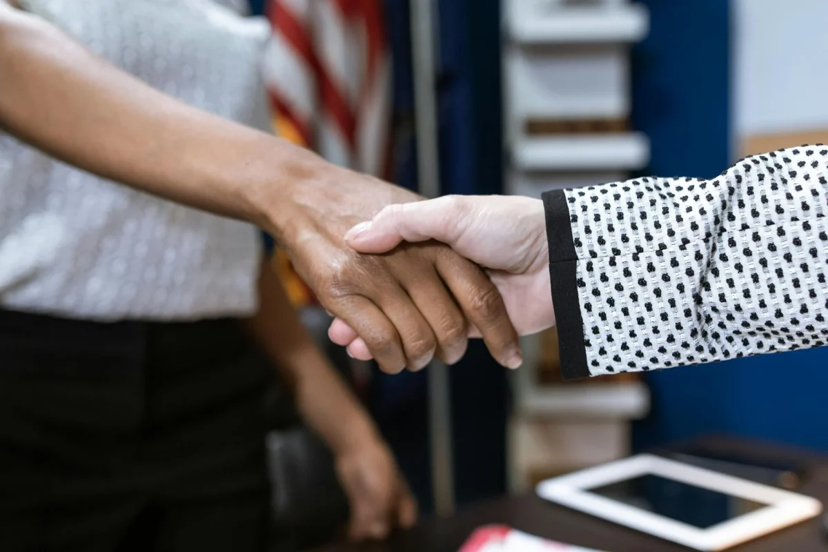 Jasa Pasang Parket Basket Surabaya Terbaik 2026 7 Professional Handshake Business Deal