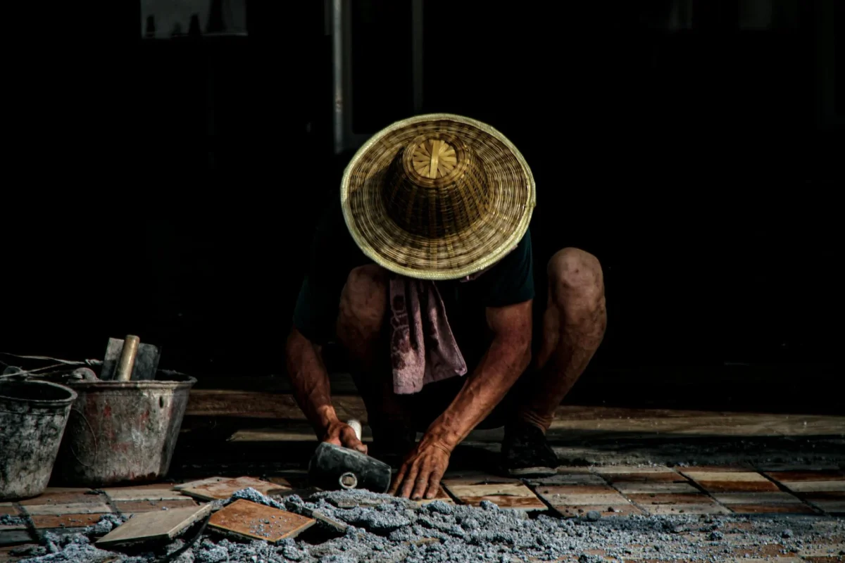 Professional Worker Flooring Installation