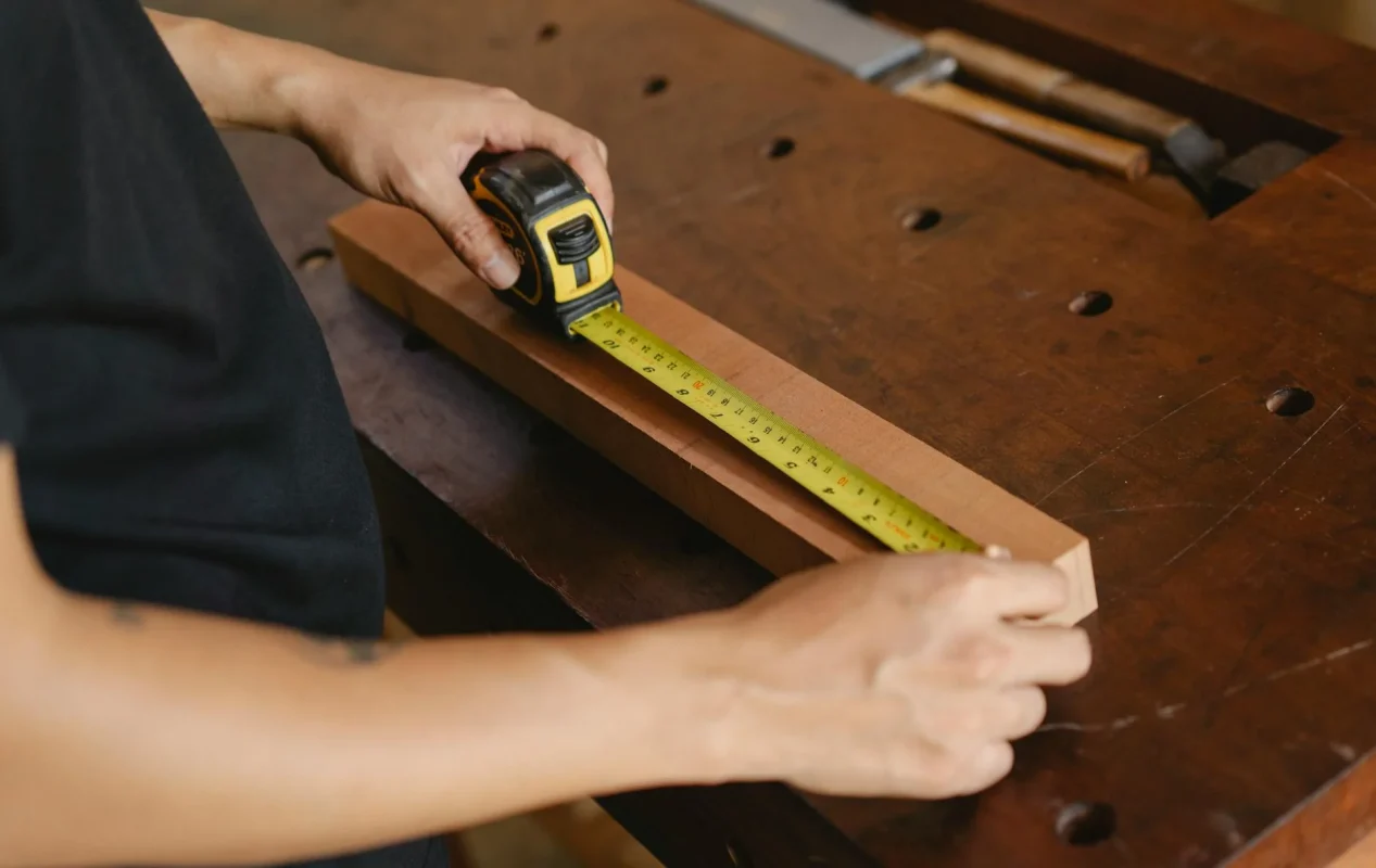 Foto oleh Ono Kosuki di Pexels Wood Samples Measuring Tape